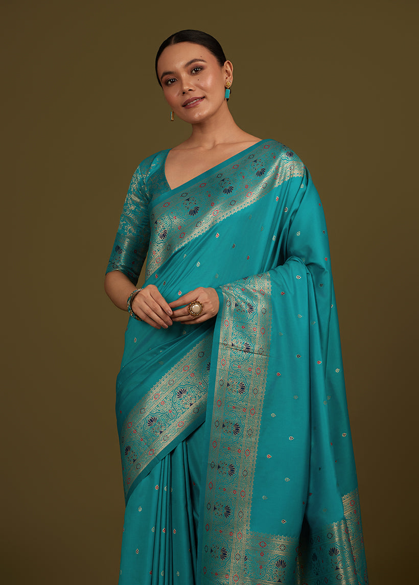 Monjolika Fashion Elegant Cyan Banarasi Silk Blend SareeBrocade Motifs & Zari Woven Splendor | Grocsy