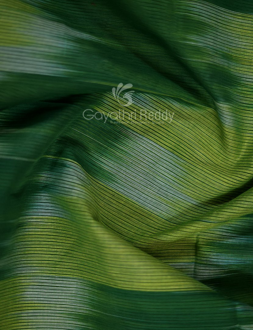 Dual Shades of Parrot Green And Mango Green Mangalagiri Ikkat Cotton Saree By Gayathri Reddy Designer Studio | Grocsy