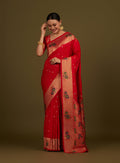 Monjolika Fashion Red Woven Silk Blend SareeWith Zari Work & Floral Motifs | Grocsy