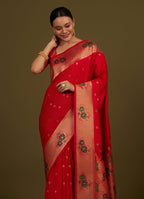 Monjolika Fashion Red Woven Silk Blend SareeWith Zari Work & Floral Motifs | Grocsy