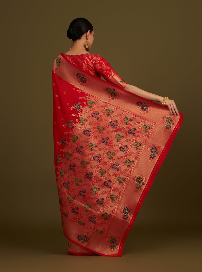 Monjolika Fashion Red Woven Silk Blend SareeWith Zari Work & Floral Motifs | Grocsy