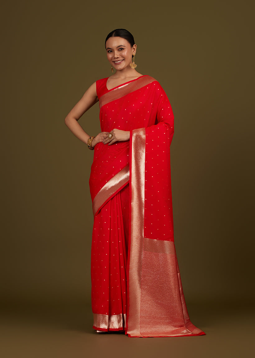 Monjolika Fashion Red Woven Silk Blend SareeWith Zari Work & Floral Motifs | Grocsy