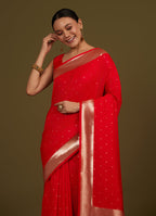Monjolika Fashion Red Woven Silk Blend SareeWith Zari Work & Floral Motifs | Grocsy