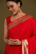 Monjolika Fashion Red Woven Silk Blend SareeWith Zari Work & Floral Motifs | Grocsy