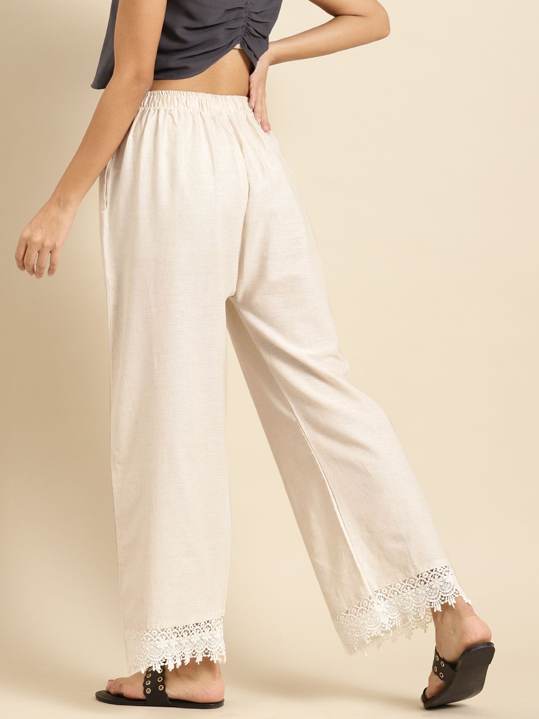 TAG 7 Women Off-White Solid Hem Design Straight Palazzos | Grocsy