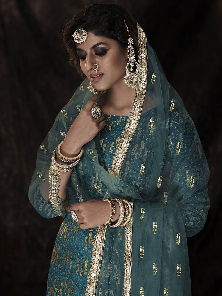 Myra Dark Firozi Net Embroidered Sharara Suit | Grocsy