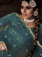 Myra Dark Firozi Net Embroidered Sharara Suit | Grocsy