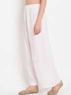 TAG 7 Women White Solid Straight Palazzos | Grocsy