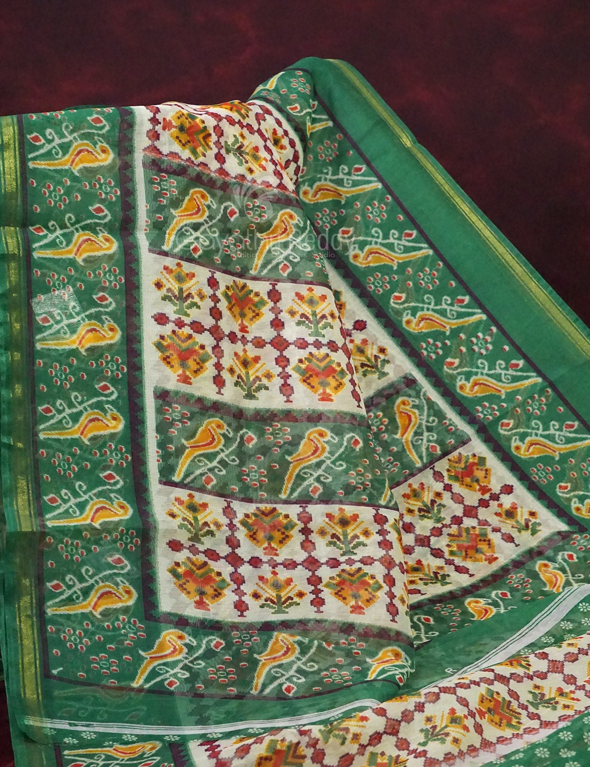 Shades of Off White And Mango Green Colour Patan Patola Semi Chanderi Saree By Gayathri Reddy Designer Studio | Grocsy