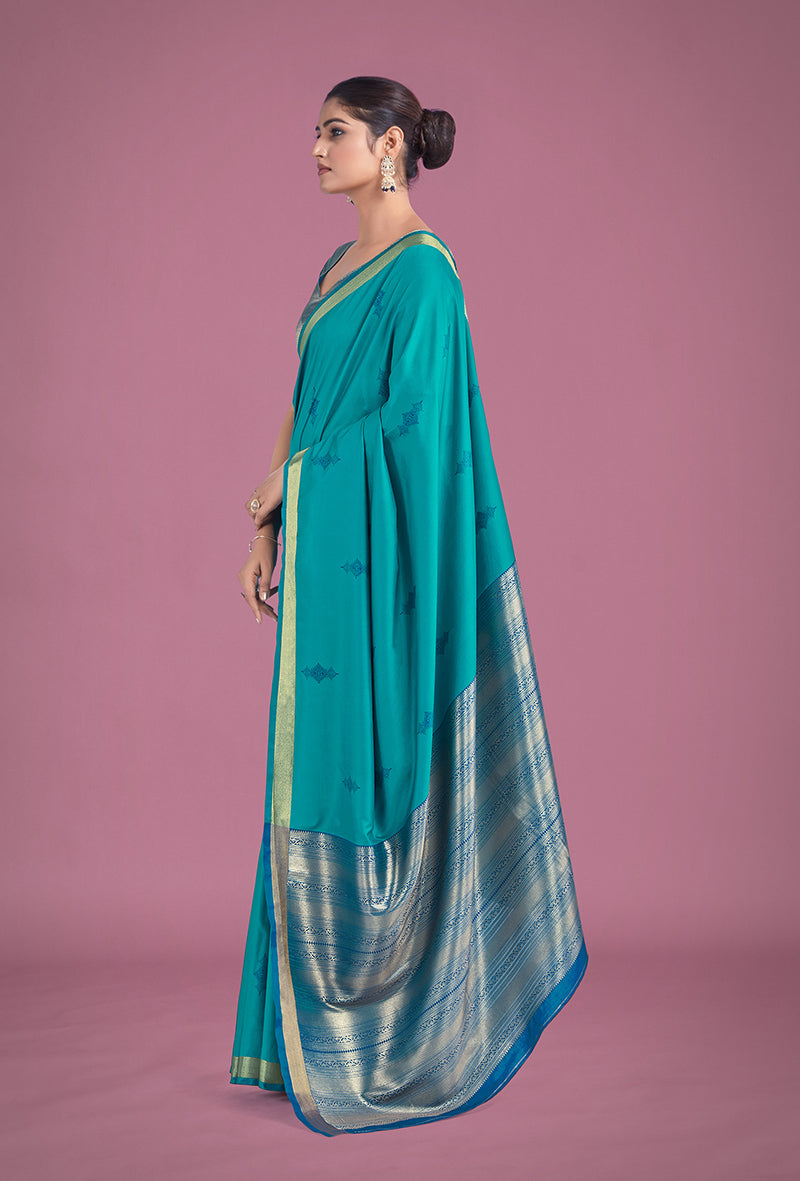 Monjolika Fashion Charming Turquoise Color Silk Golden Zari Woven Ceremony Saree | Grocsy