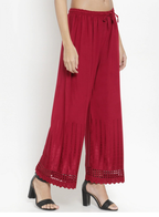 PAVONINE Maroon Color Aari Work Minar Design Rayon Fabric Shrarara | Grocsy