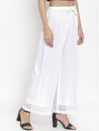 PAVONINE White Color Aari Work Minar Design Rayon Fabric Shrarara | Grocsy