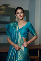 Vardha Sky Teal Blue Zari Work Kanjeevaram Silk Saree | Grocsy