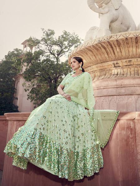 Myra Pista Green Soft Net Heavy Embroidered Lehenga | Grocsy