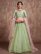 Myra Pista Green Soft Net Heavy Embroidered Lehenga | Grocsy