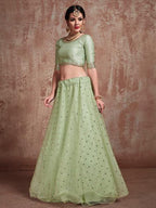Myra Pista Green Soft Net Heavy Embroidered Lehenga | Grocsy