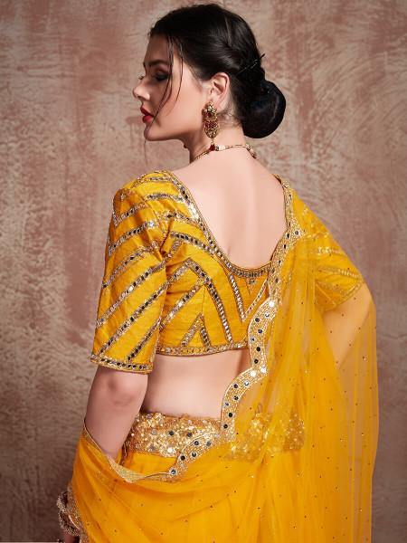 Myra Musturd Soft Net Heavy Embroidered Lehenga | Grocsy