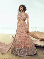 Myra Peach Embroidered Net Lehenga | Grocsy