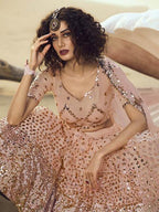 Myra Peach Embroidered Net Lehenga | Grocsy
