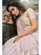 Myra Cream and Lilac Net Embroidered Lehenga Choli | Grocsy