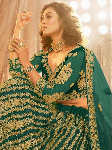 Myra Rama Green Heavy Embroidered Net Lehenga | Grocsy