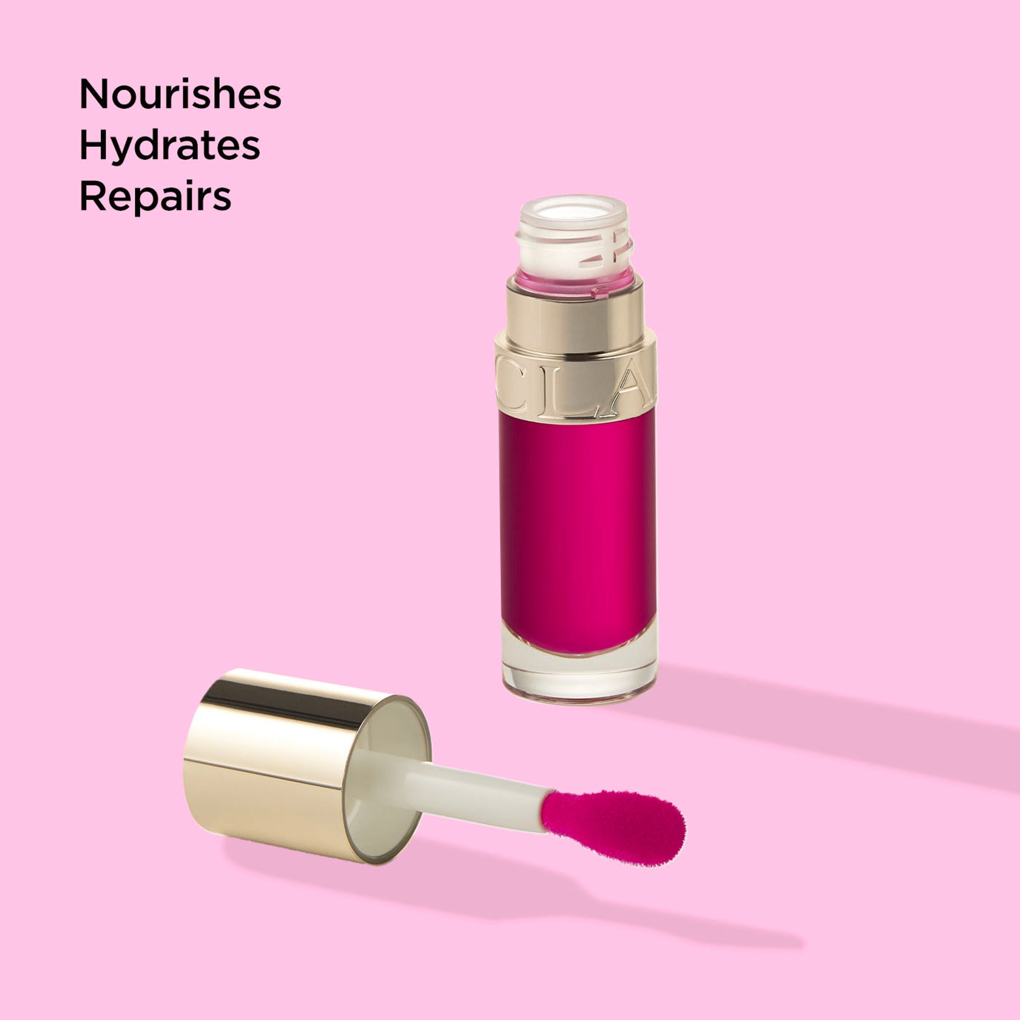Clarins Lip Comfort Oil - 02 Raspberry | Grocsy