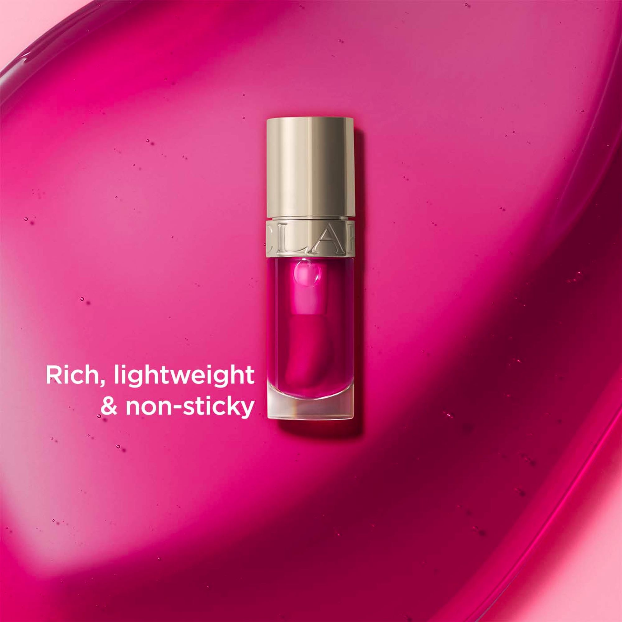 Clarins Lip Comfort Oil - 02 Raspberry | Grocsy