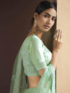 Myra Green Heavy Embroidered Soft Net bridal Lehenga | Grocsy