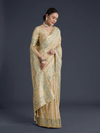 Monjolika Fashion Cream Banarasi Satin Silk Saree With Zari Border And Butti Work | Grocsy