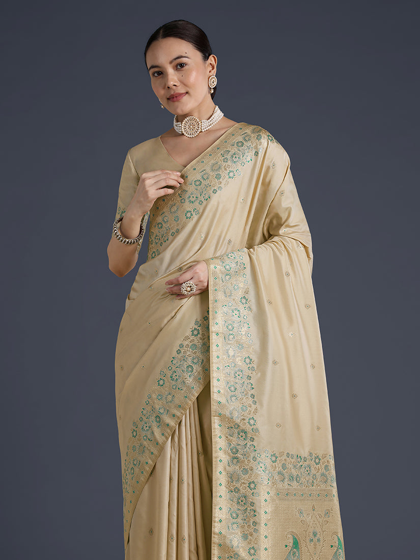 Monjolika Fashion Cream Banarasi Satin Silk Saree With Zari Border And Butti Work | Grocsy