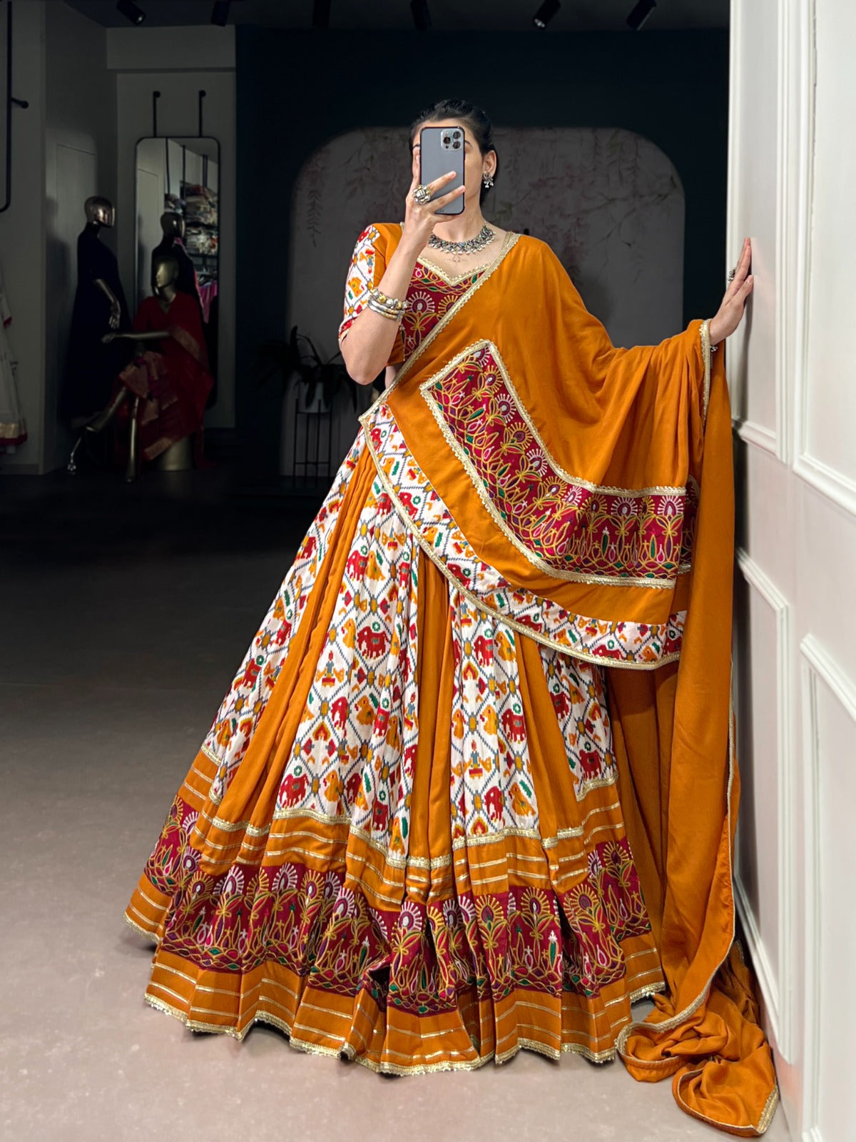 Lorenvalley Fashion Mustard Rayon with Printed Silk Patola Print with Gamthi Work and Lace Touch Up Lehenga Choli with Dupatta | Grocsy