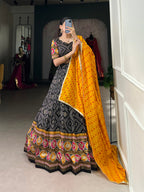 Lorenvalley Black Tussar Silk Bandhej and Patola Print with Foil Work Lehenga Choli with Dupatta | Grocsy