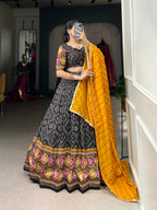 Lorenvalley Black Tussar Silk Bandhej and Patola Print with Foil Work Lehenga Choli with Dupatta | Grocsy