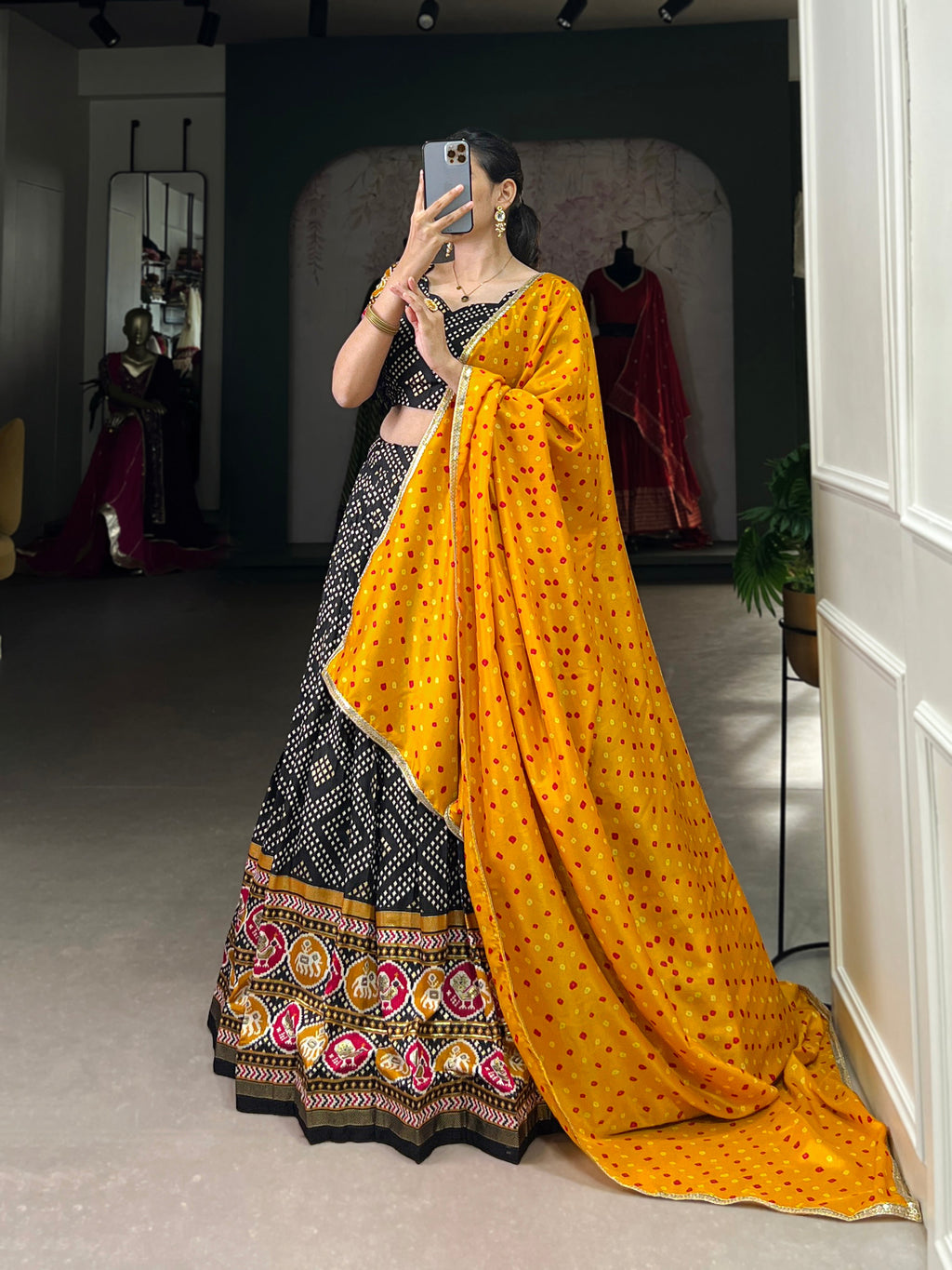 Lorenvalley Black Tussar Silk Bandhej and Patola Print with Foil Work Lehenga Choli with Dupatta | Grocsy