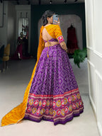 Lorenvalley Purple Tussar Silk Bandhej and Patola Print with Foil Work Lehenga Choli with Dupatta | Grocsy