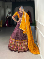 Lorenvalley Wine Tussar Silk Bandhej and Patola Print with Foil Work Lehenga Choli with Dupatta | Grocsy