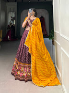 Lorenvalley Wine Tussar Silk Bandhej and Patola Print with Foil Work Lehenga Choli with Dupatta | Grocsy