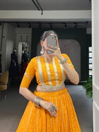 Lorenvalley Fashion Yellow Chiffon Bandhej Print with Sequins and Gotta Patti Lace Touch Up Lehenga Choli | Grocsy