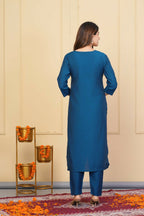 Rama Viscose Chanderi Embroidered Stitched Suit With Dupatta - Tanisha | Grocsy