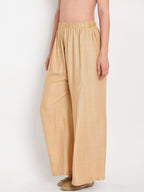 TAG 7 Women Beige Solid Straight Palazzos | Grocsy