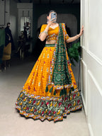 Lorenvalley Mustard Tussar Silk Patola Print with Gamthi Work Lace and Foil Work Lehenga Choli with Dupatta | Grocsy