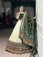 Lorenvalley Fashion Offwhite Tasar Silk Patola Print With Foil Work And Real Mirror Gamthi Work With Lace Touch Up Lehenga Choli with Dupatta | Grocsy