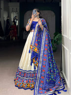 Lorenvalley Fashion Offwhite Tasar Silk Patola Print With Foil Work And Real Mirror Gamthi Work With Lace Touch Up Lehenga Choli with Dupatta | Grocsy