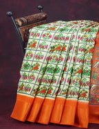 Shades of Cream And Orange Colour Blouse Patola Design Semi Chanderi Saree By Gayathri Reddy Designer Studio | Grocsy