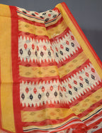 Shades of Cream And Red Colour Blouse Patola Print Semi Chanderi Saree By Gayathri Reddy Designer Studio | Grocsy