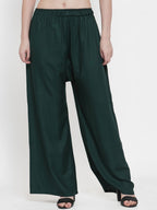 TAG 7 Women Green Solid Flared Palazzos | Grocsy