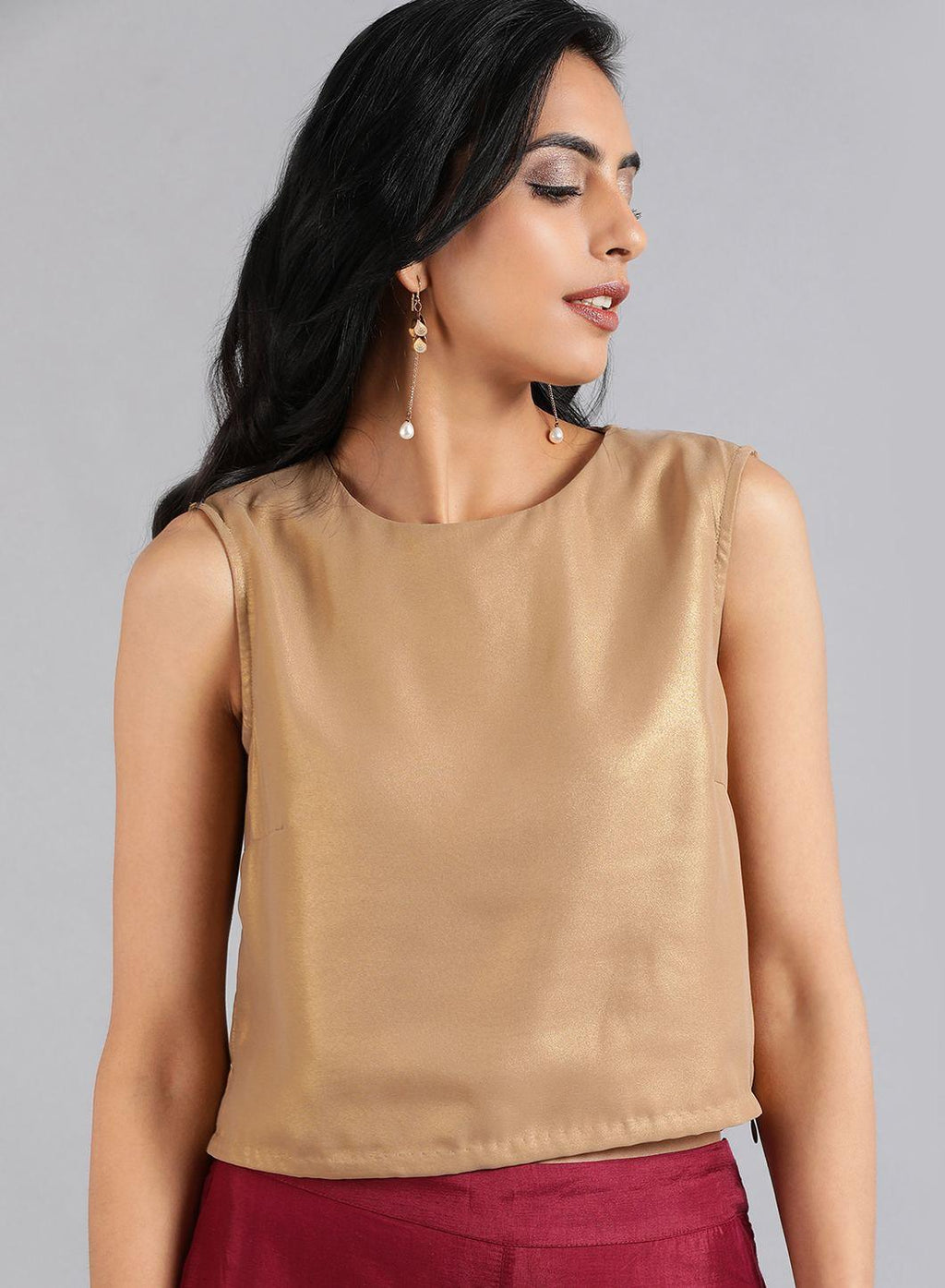 W for Woman Golden Round Neck Solid Sleeveless Festive Top | Grocsy