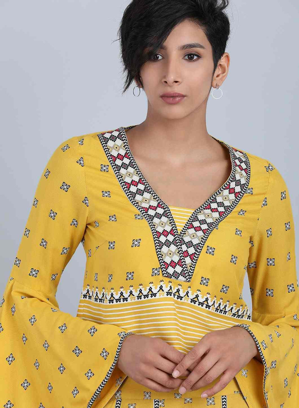 W for Woman Yellow V Neck Printed Top | Grocsy
