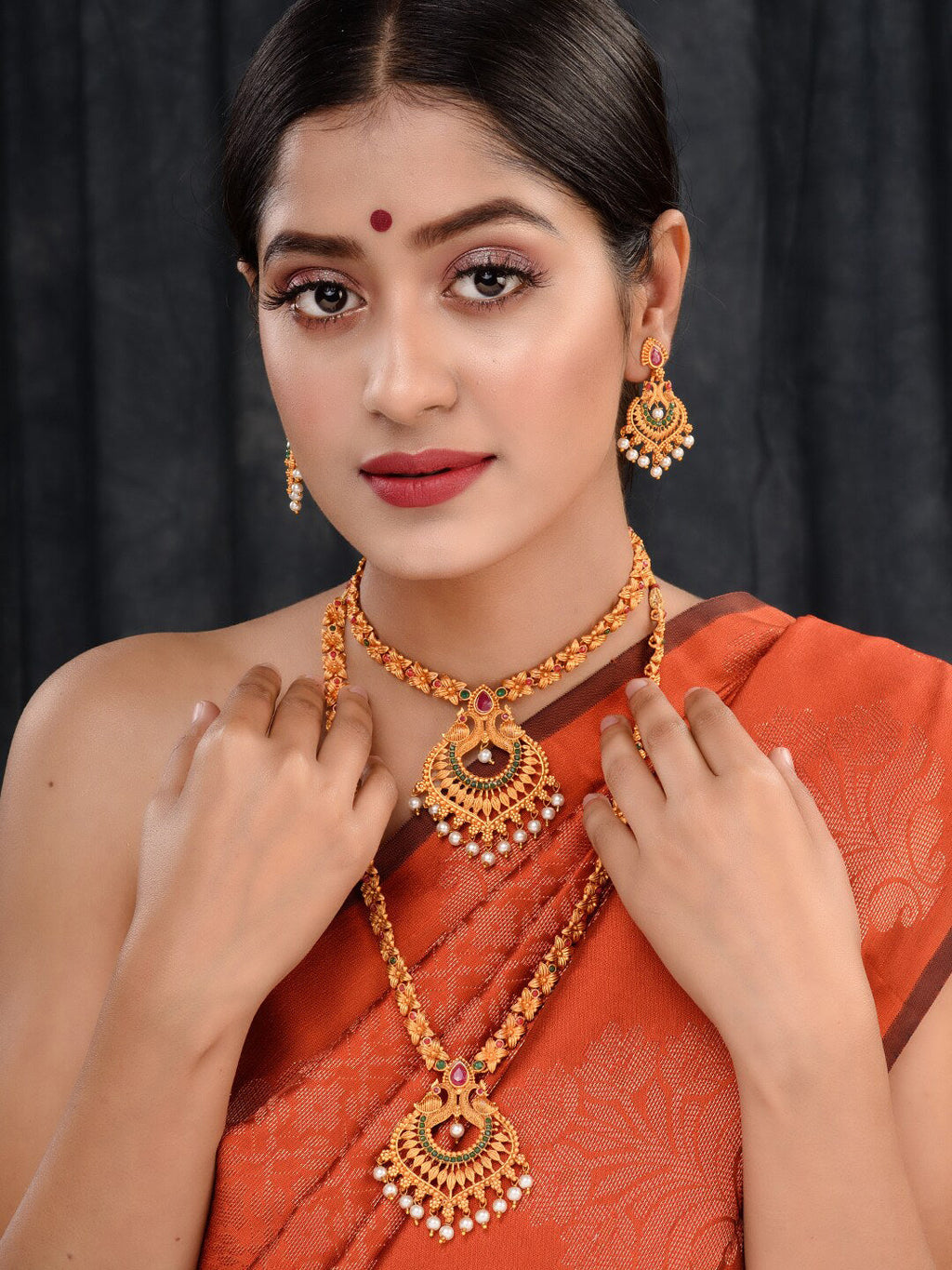 Saraf RS Jewellery Gold-Polished Red & Green Bridal Temple Jewellery Set | Grocsy