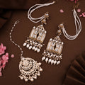 Tehzeeb Creations Stylish White Pearls Doli-Palki Kundan Earrings With Ear Chain With Tikka | Grocsy